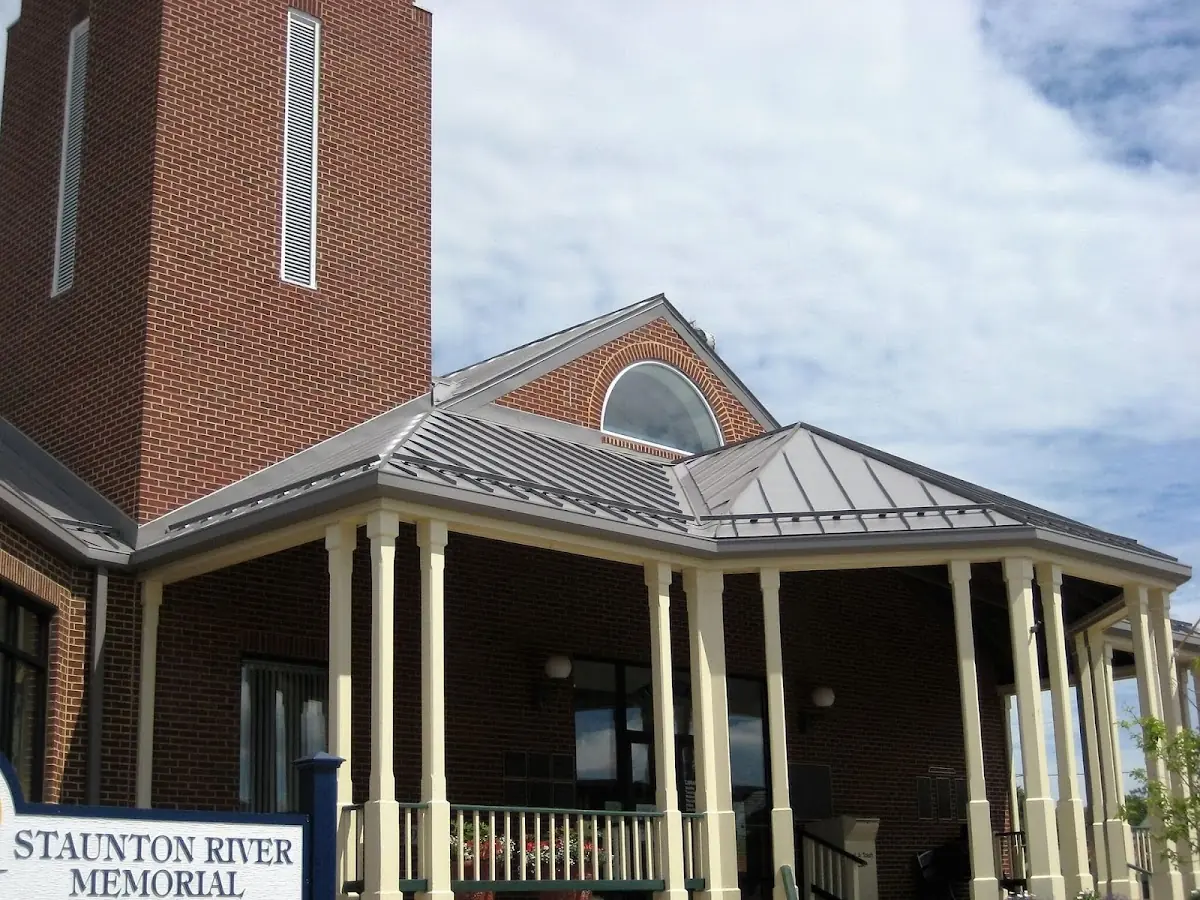 Skilled roofing craftsmen working on a residential roof in Thibodaux